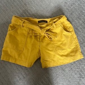 Belted. Tie front shorts from the limited